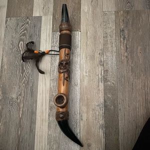 A wooden hand crafted Ecuadorian smoking pipe